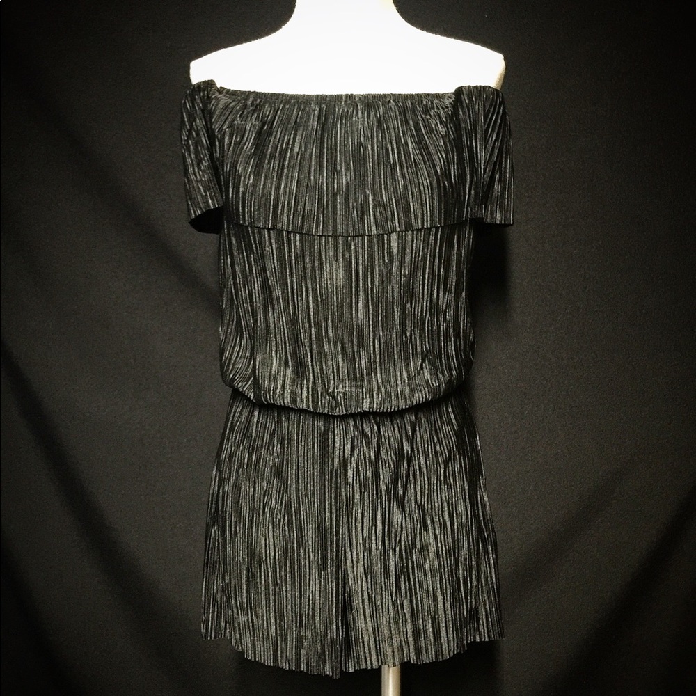 pleated off shoulder romper with ruffled detail